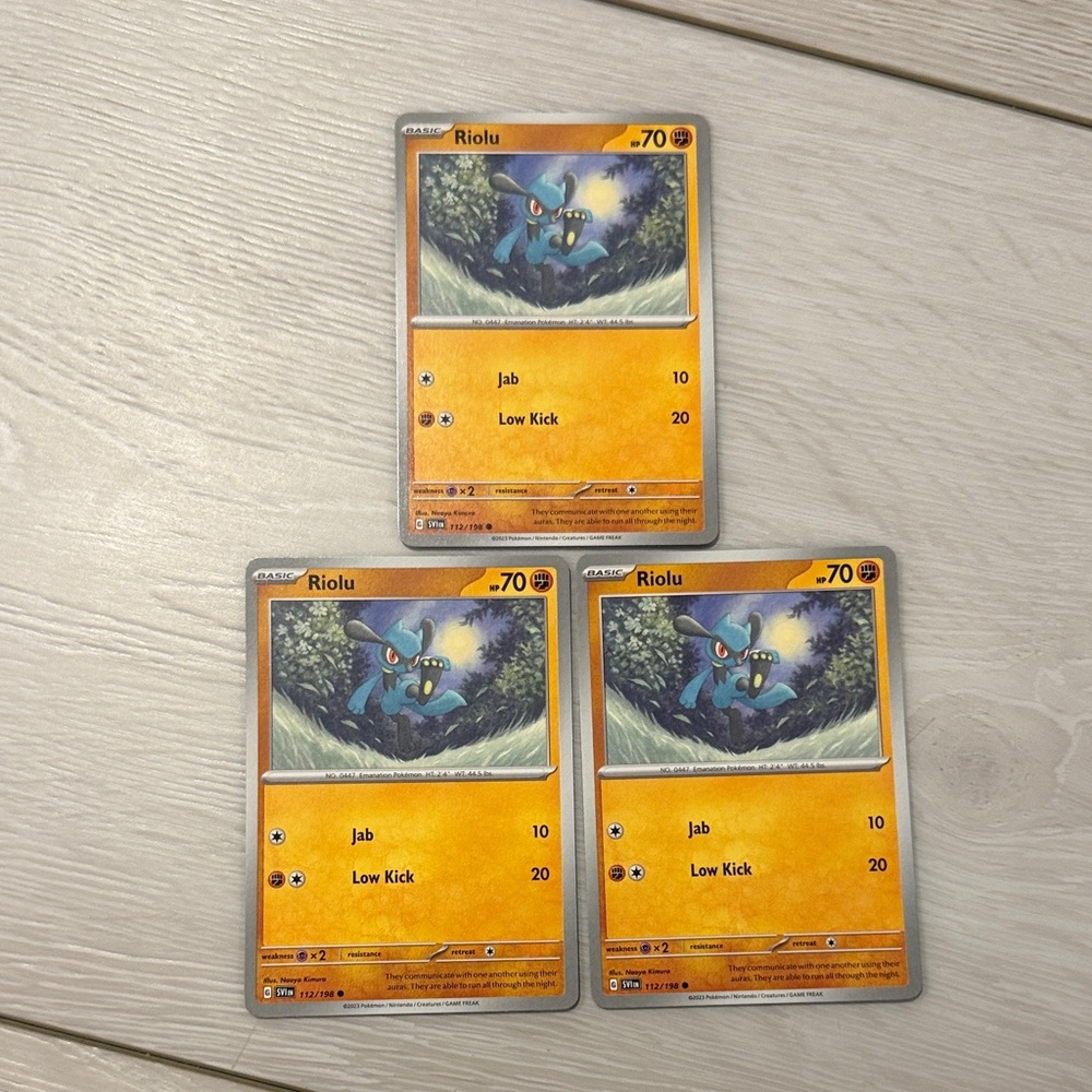 Pokemon Riolu Card Trio - Vibrant Orange